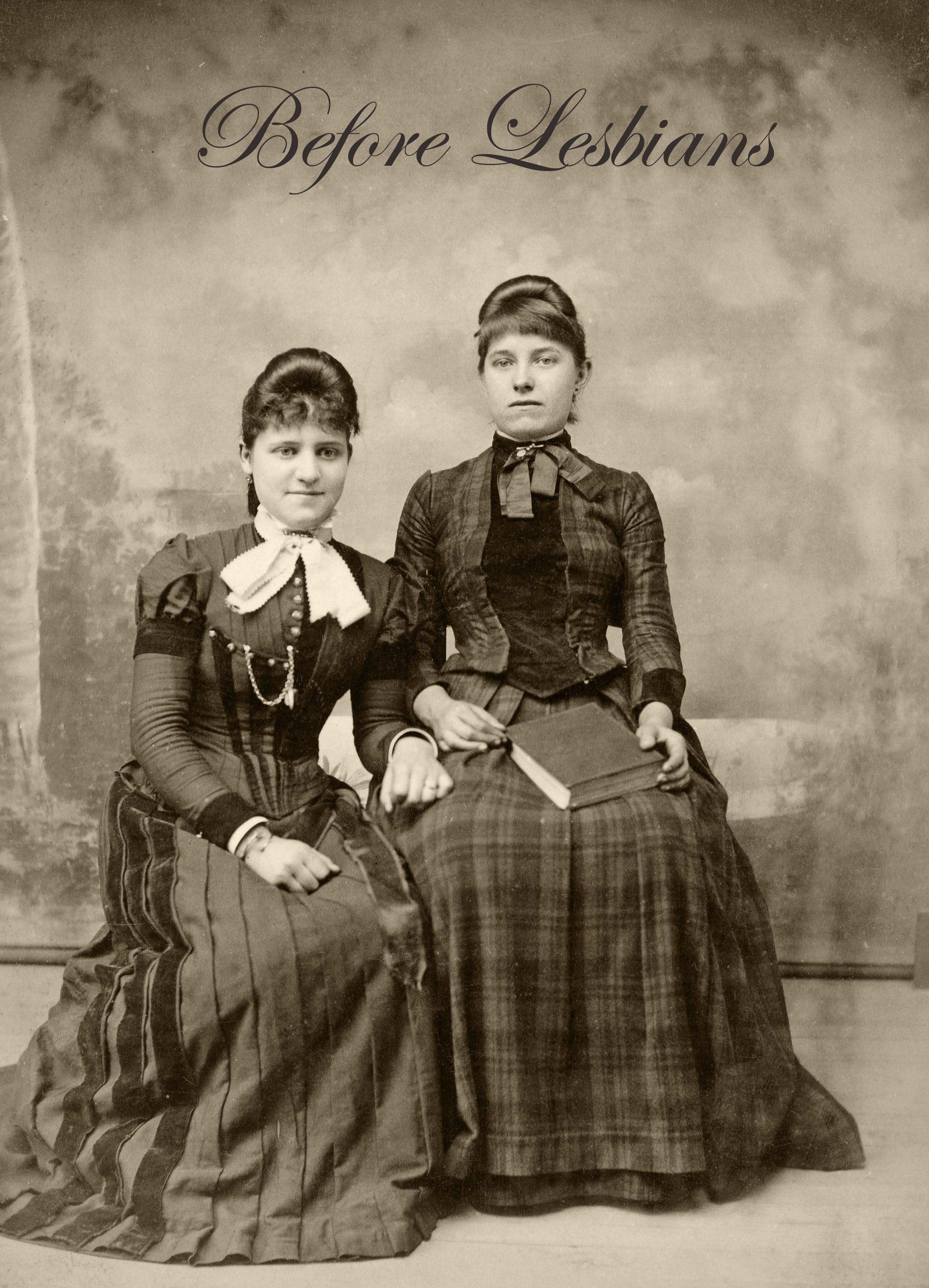 An old-fashioned photo of two women sitting side by side with book