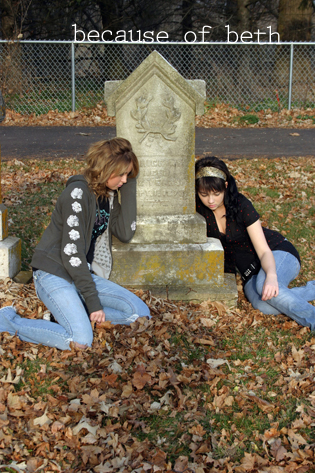 Two girls at a grave